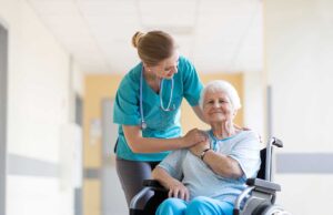 Older adult using a walker enters an accessible vehicle with assistance for a community outing.